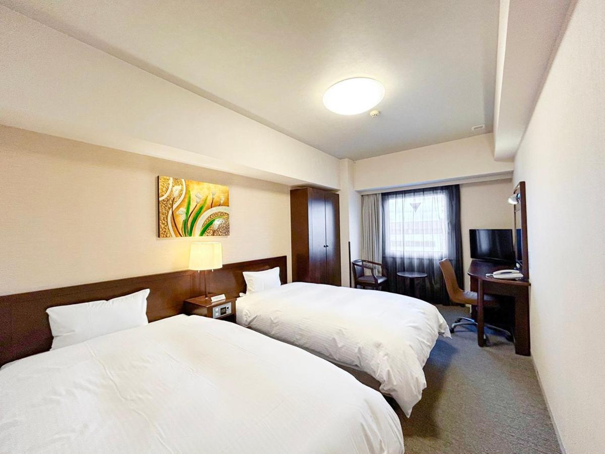 Hotel Route Inn Hirosaki Ekimae Bagian luar foto