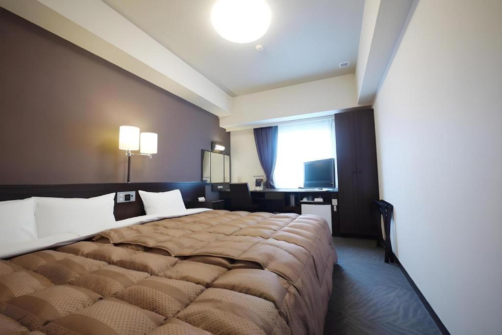 Hotel Route Inn Hirosaki Ekimae Bagian luar foto